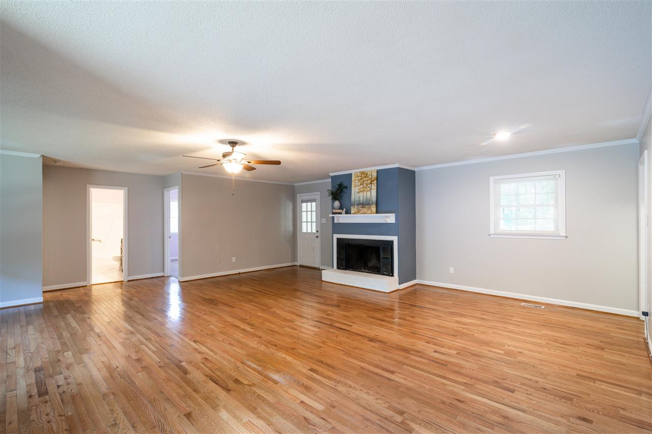 1603 Milton Road Durham, NC 27712 - Photo 4 of 19 Main living area is open with charming fireplace