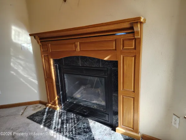 a close view of a fireplace in a room