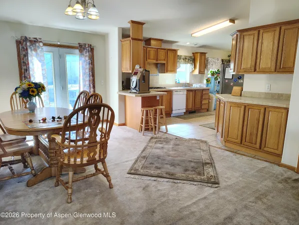 a view of a dining room with furniture