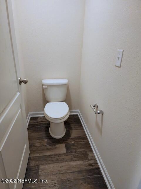 4295 Packer Meadow Way Middleburg, FL 32068 - Photo 13 of 26 a bathroom with a toilet and a shower
