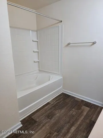 a bathroom with a bathtub