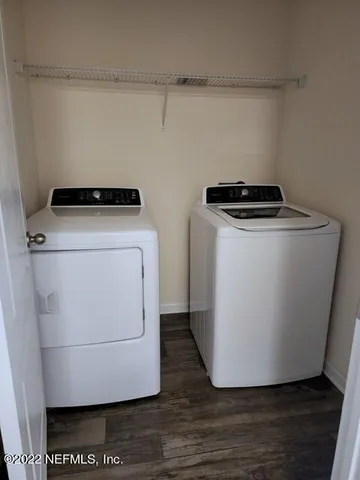 a utility room with washer and dryer
