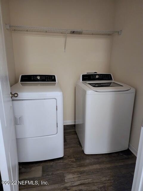 4295 Packer Meadow Way Middleburg, FL 32068 - Photo 16 of 26 a utility room with washer and dryer