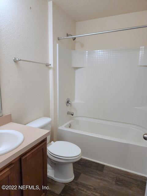 4295 Packer Meadow Way Middleburg, FL 32068 - Photo 21 of 26 a bathroom with a sink a toilet and shower