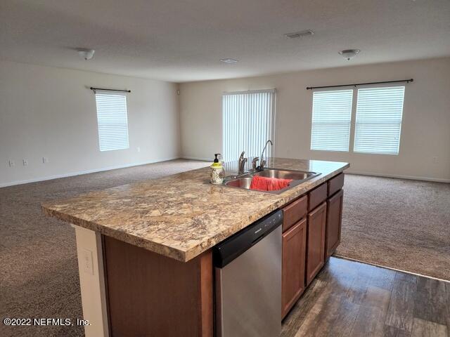 4295 Packer Meadow Way Middleburg, FL 32068 - Photo 6 of 26 a bathroom with a granite countertop sink and a window