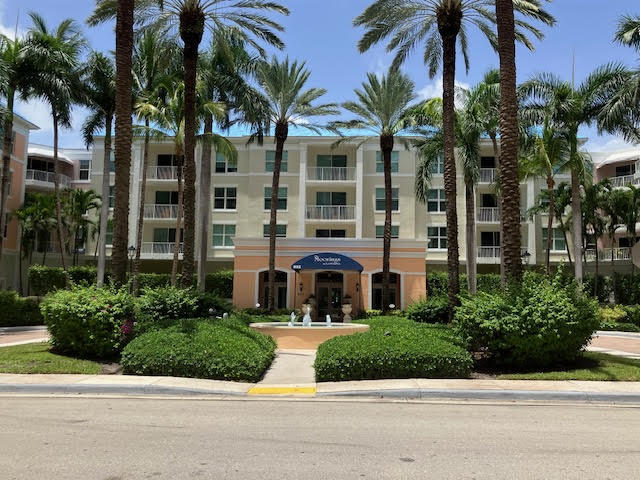 802 West Windward Way, Unit 204 Lantana, FL 33462 - Photo 2 of 29 front view of a house with a yard