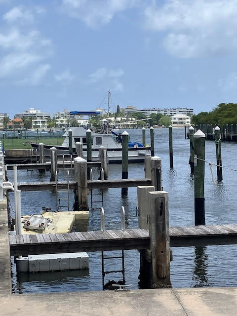 802 West Windward Way, Unit 204 Lantana, FL 33462 - Photo 28 of 29 a view of roof deck with seating space and barbeque oven