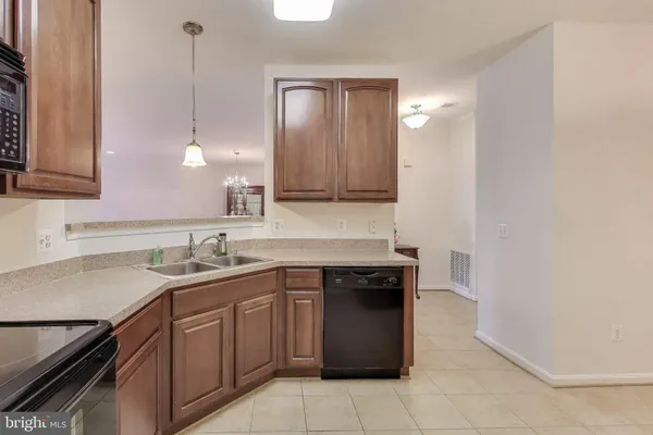$375,000 | 13501 Belle Chasse Boulevard, Unit 215, Laurel, MD 20707