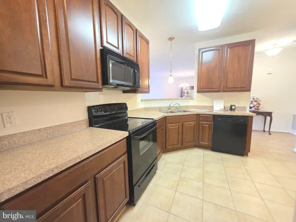 $375,000 | 13501 Belle Chasse Boulevard, Unit 215, Laurel, MD 20707