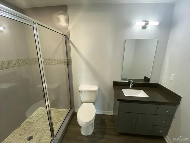 a view of a hallway with a chandelier