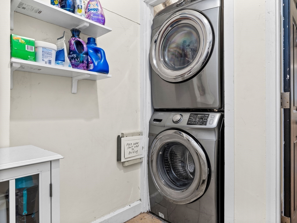37 East Springfield Street, Unit 1 Boston, MA 02118 - Photo 13 of 18 a view of a hallway with washer and dryer
