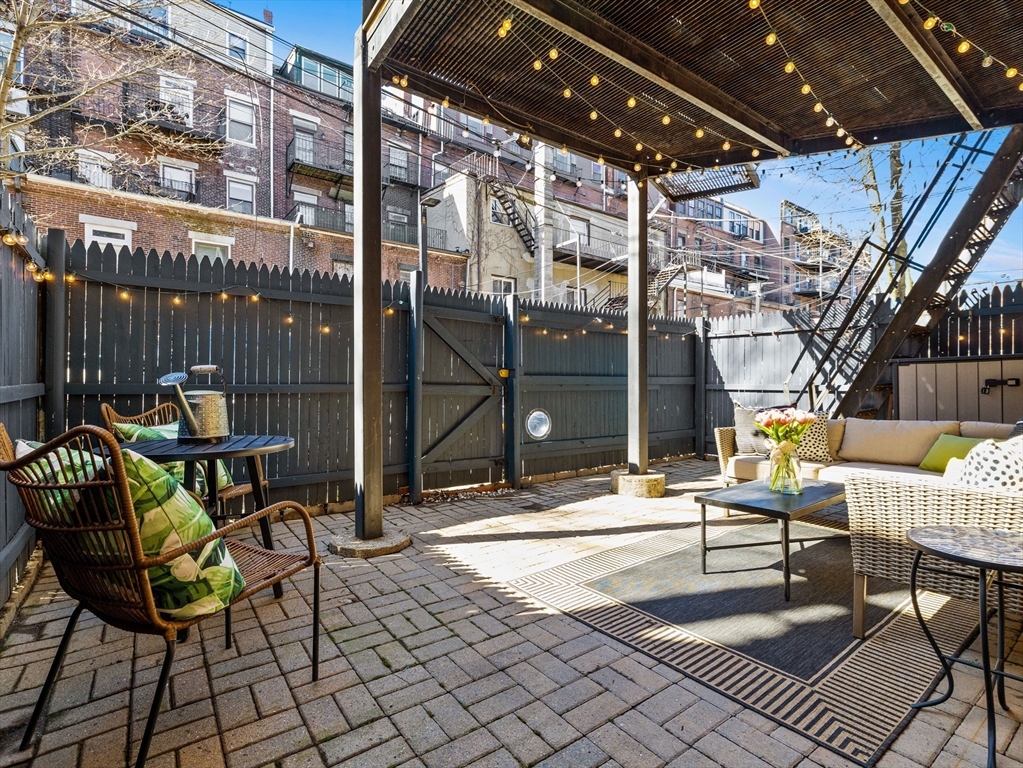 37 East Springfield Street, Unit 1 Boston, MA 02118 - Photo 14 of 18 a building outdoor space with patio furniture and potted plants