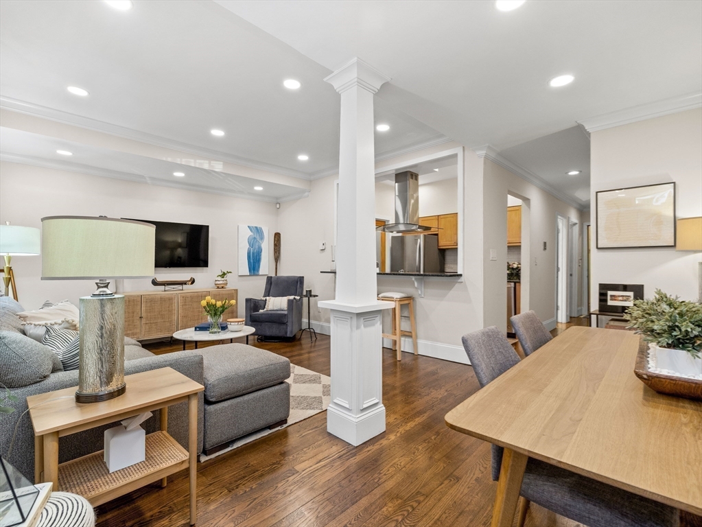 37 East Springfield Street, Unit 1 Boston, MA 02118 - Photo 9 of 18 a living room with furniture and a flat screen tv