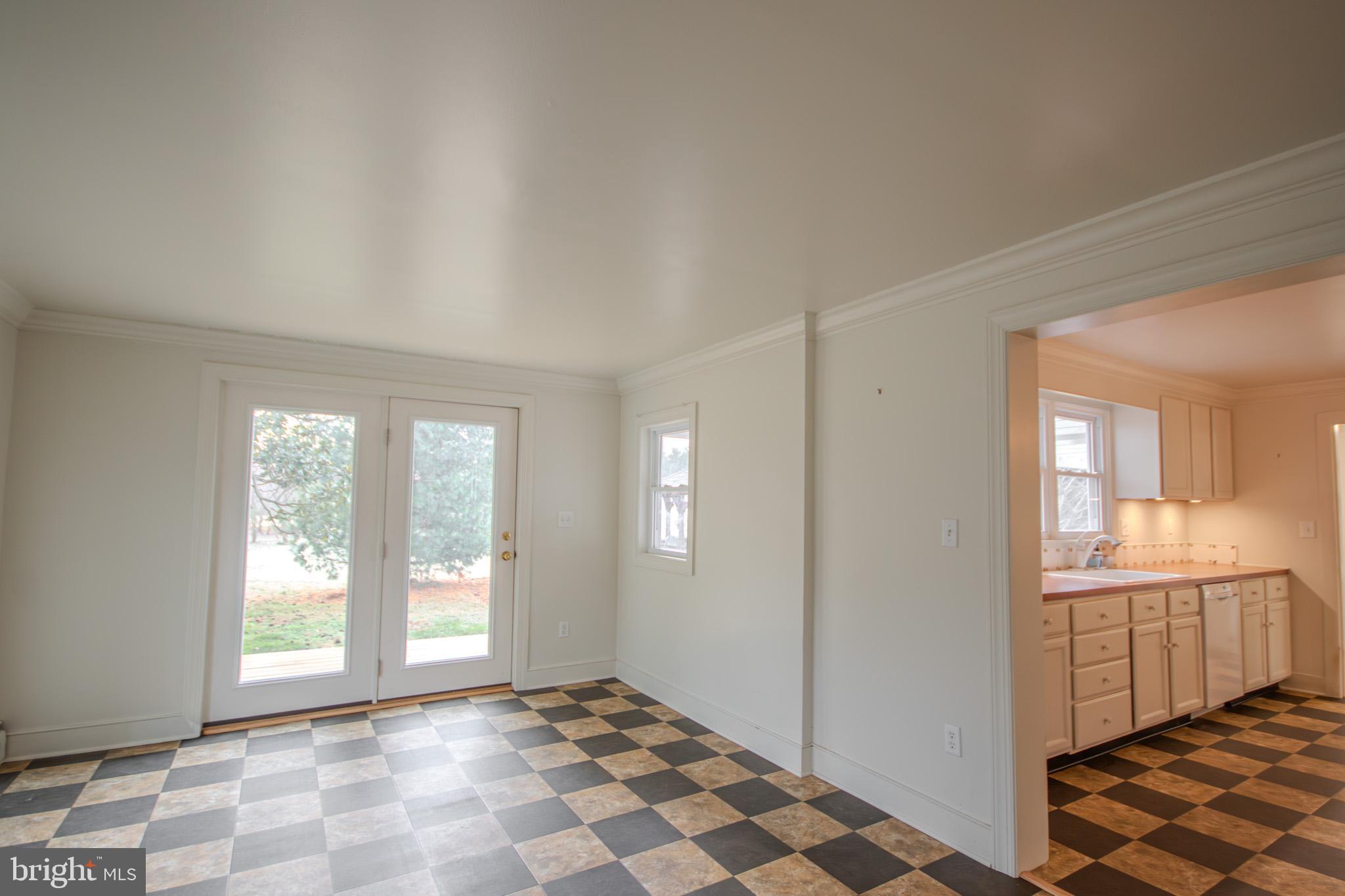 6817 Quantico Road Hebron, MD 21830 - Photo 12 of 39 a view of a room with windows and dual sinks