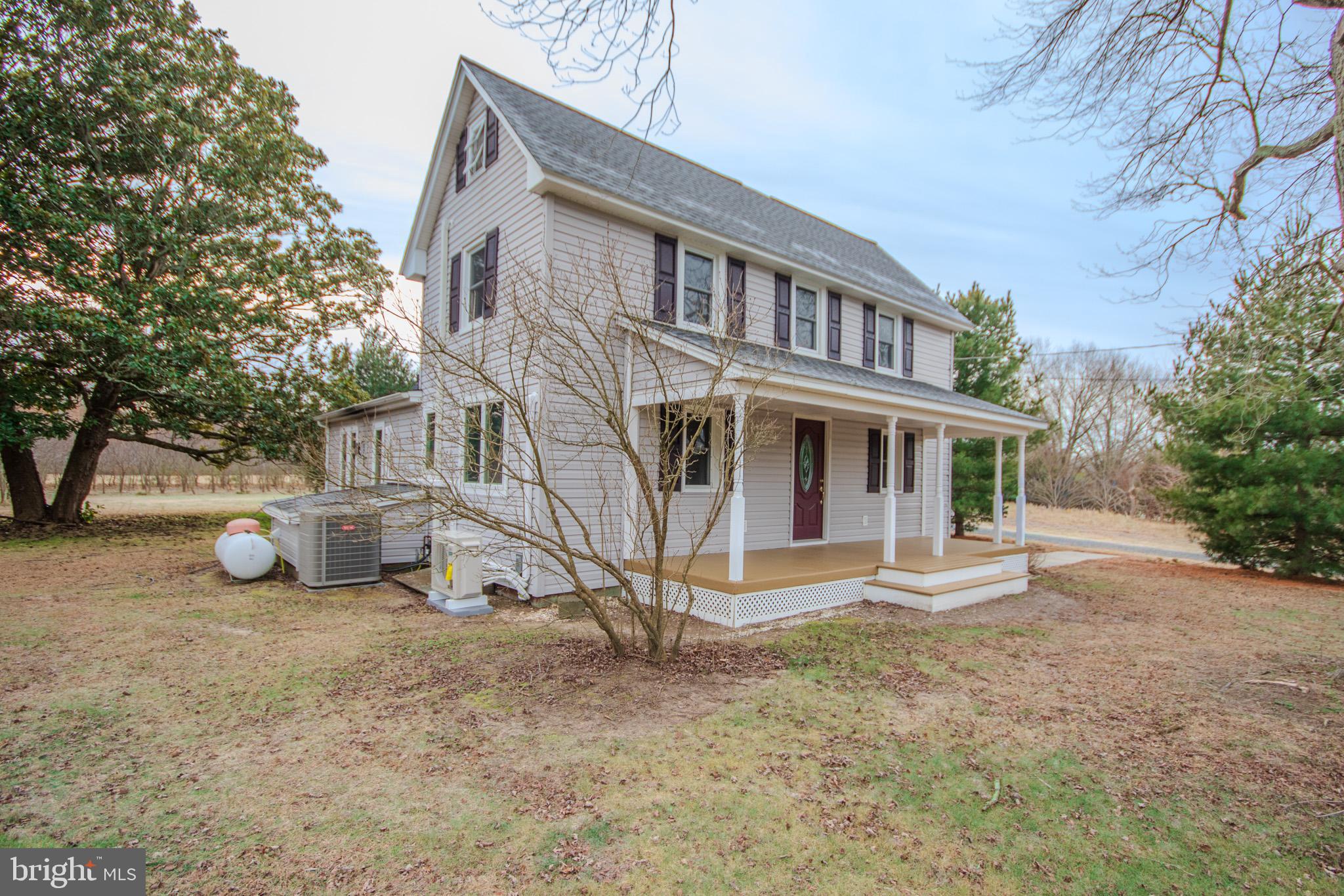 6817 Quantico Road Hebron, MD 21830 - Photo 2 of 39 front view of house with a yard