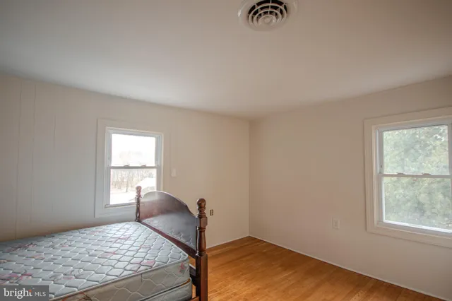 a view of a bedroom with window