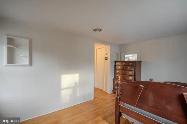 a view of workspace with wooden floor