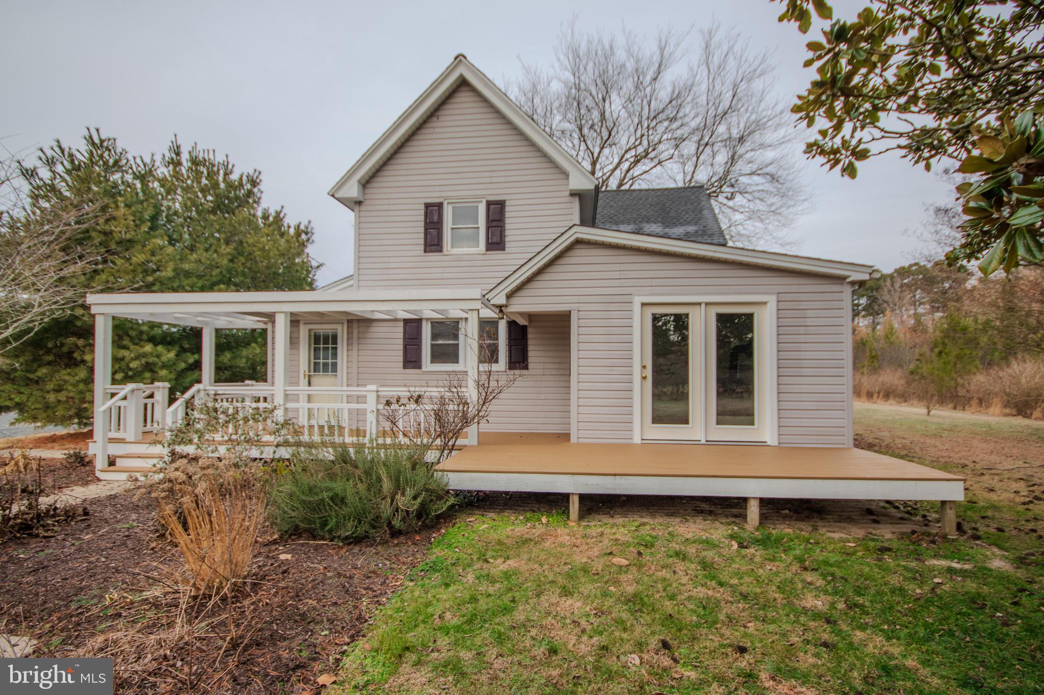 6817 Quantico Road Hebron, MD 21830 - Photo 28 of 39 a front view of a house with a yard