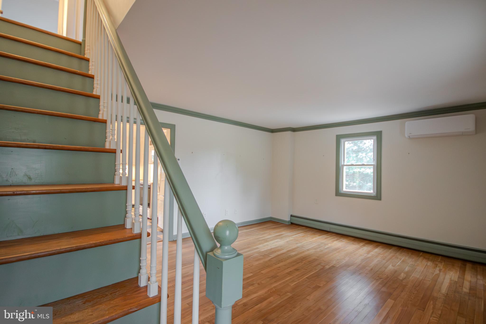 6817 Quantico Road Hebron, MD 21830 - Photo 6 of 39 a view of entryway with wooden floor