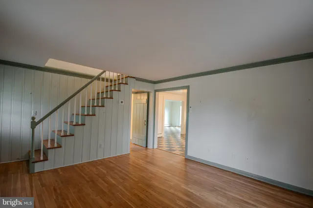 a view of entryway with wooden floor
