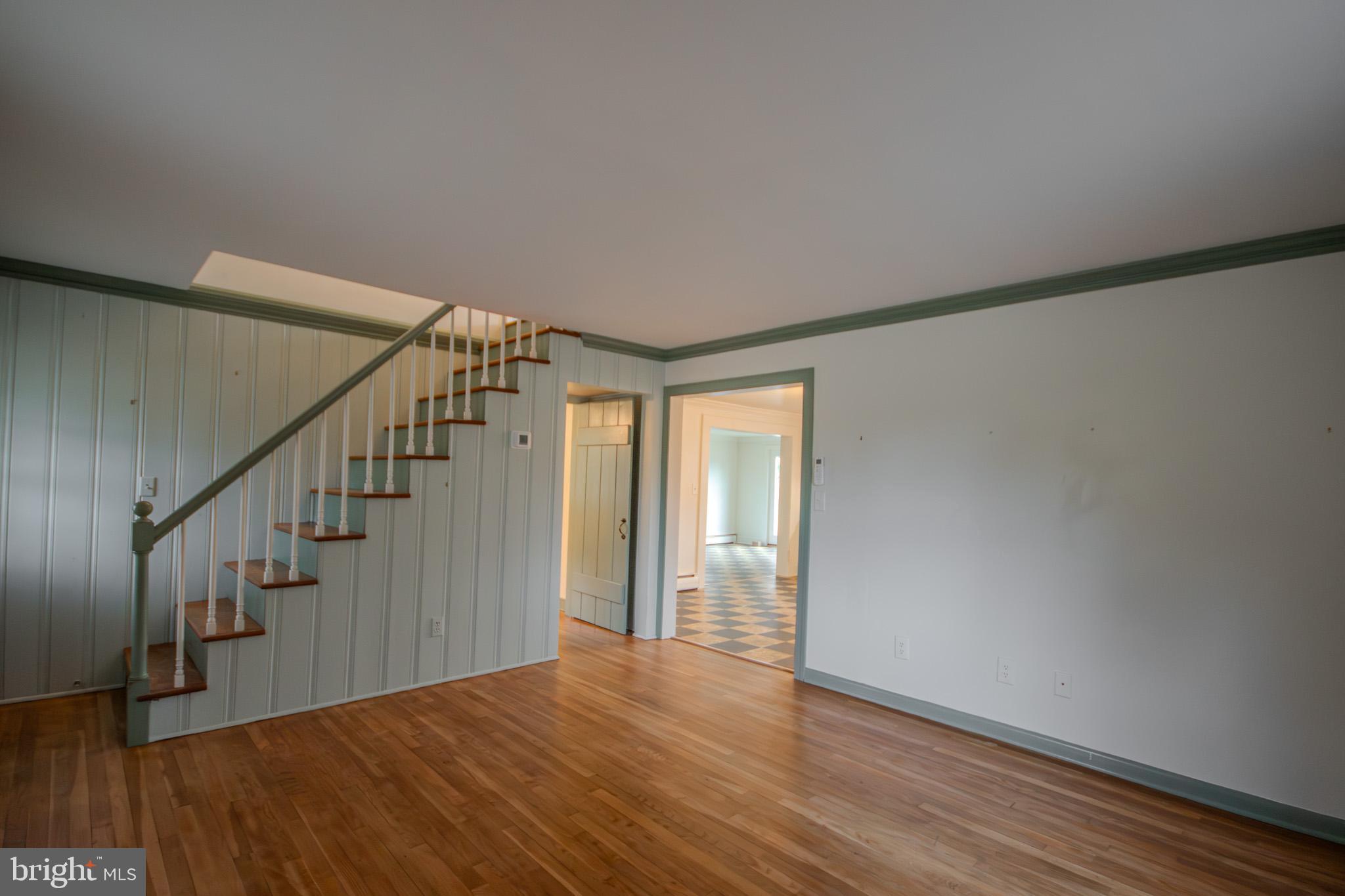 6817 Quantico Road Hebron, MD 21830 - Photo 7 of 39 a view of entryway with wooden floor
