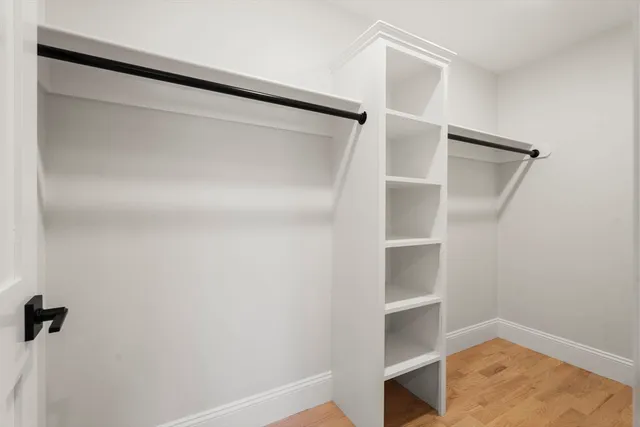 a view of an empty walk in closet