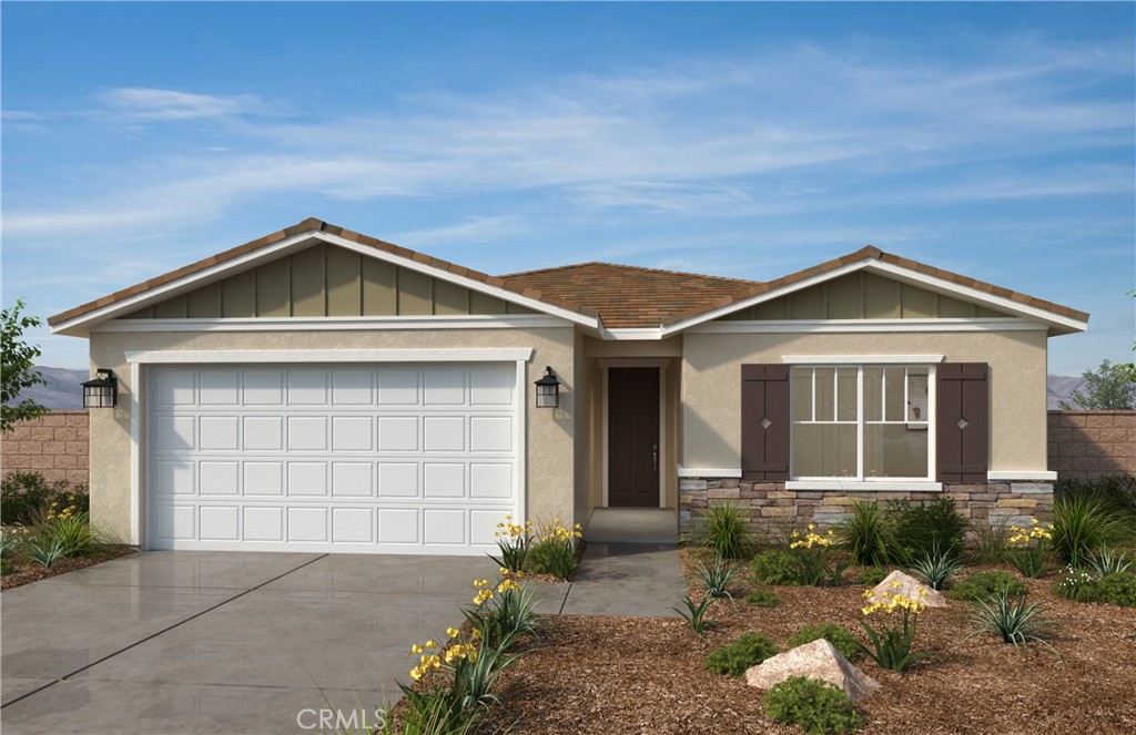 27328 Fossil Cove Perris, CA 92571 - Photo 1 of 1 a front view of a house with a yard and garage