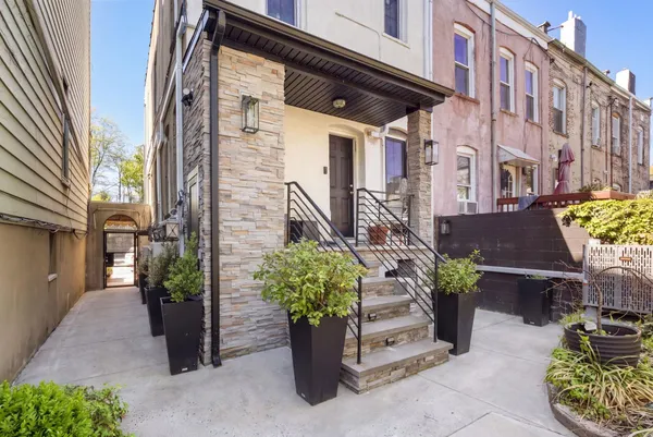a potted plant sitting in front of a building