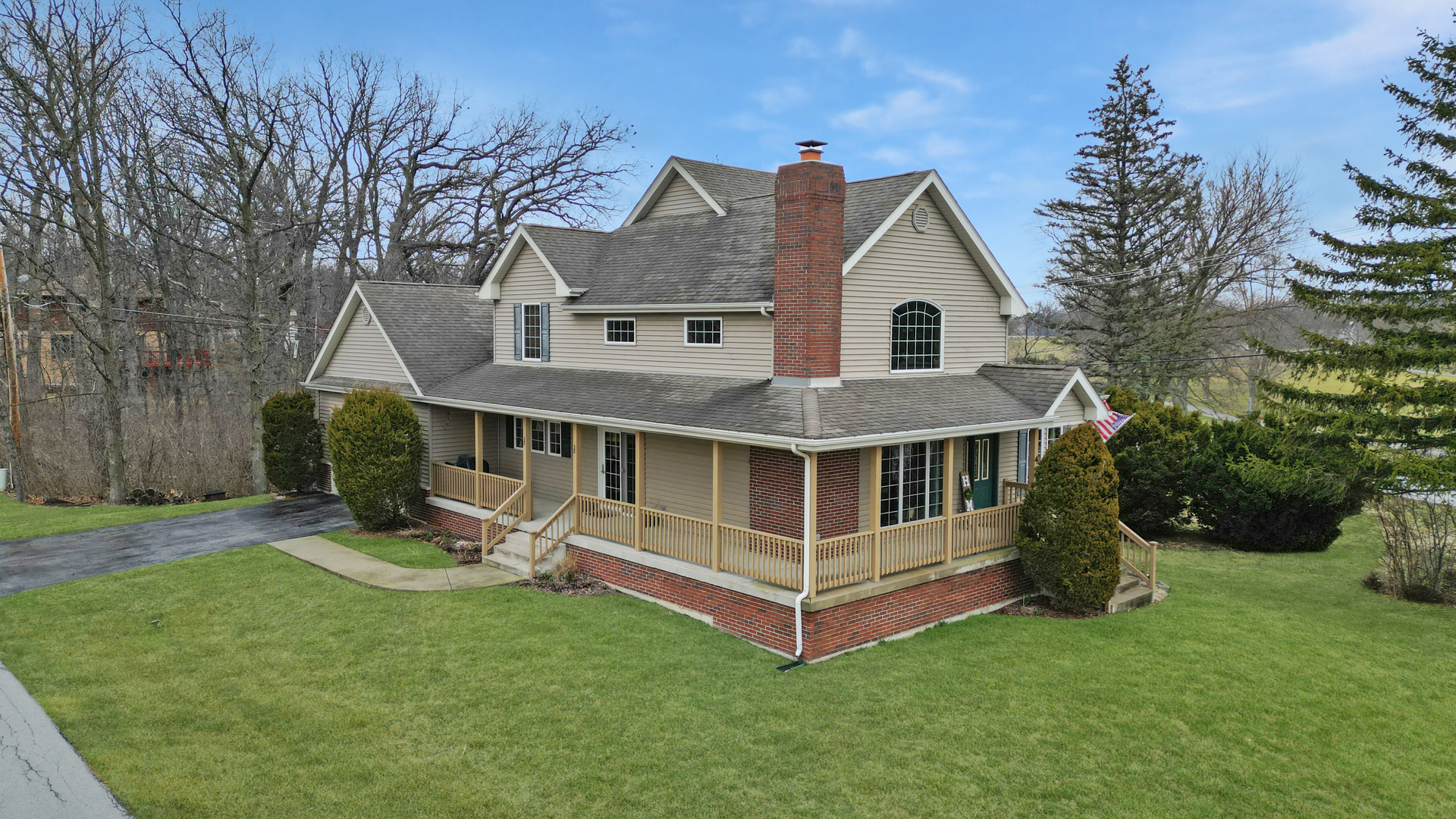 493 Aberdeen Drive Crete, IL 60417 - Photo 2 of 52 a view of house with a yard and deck