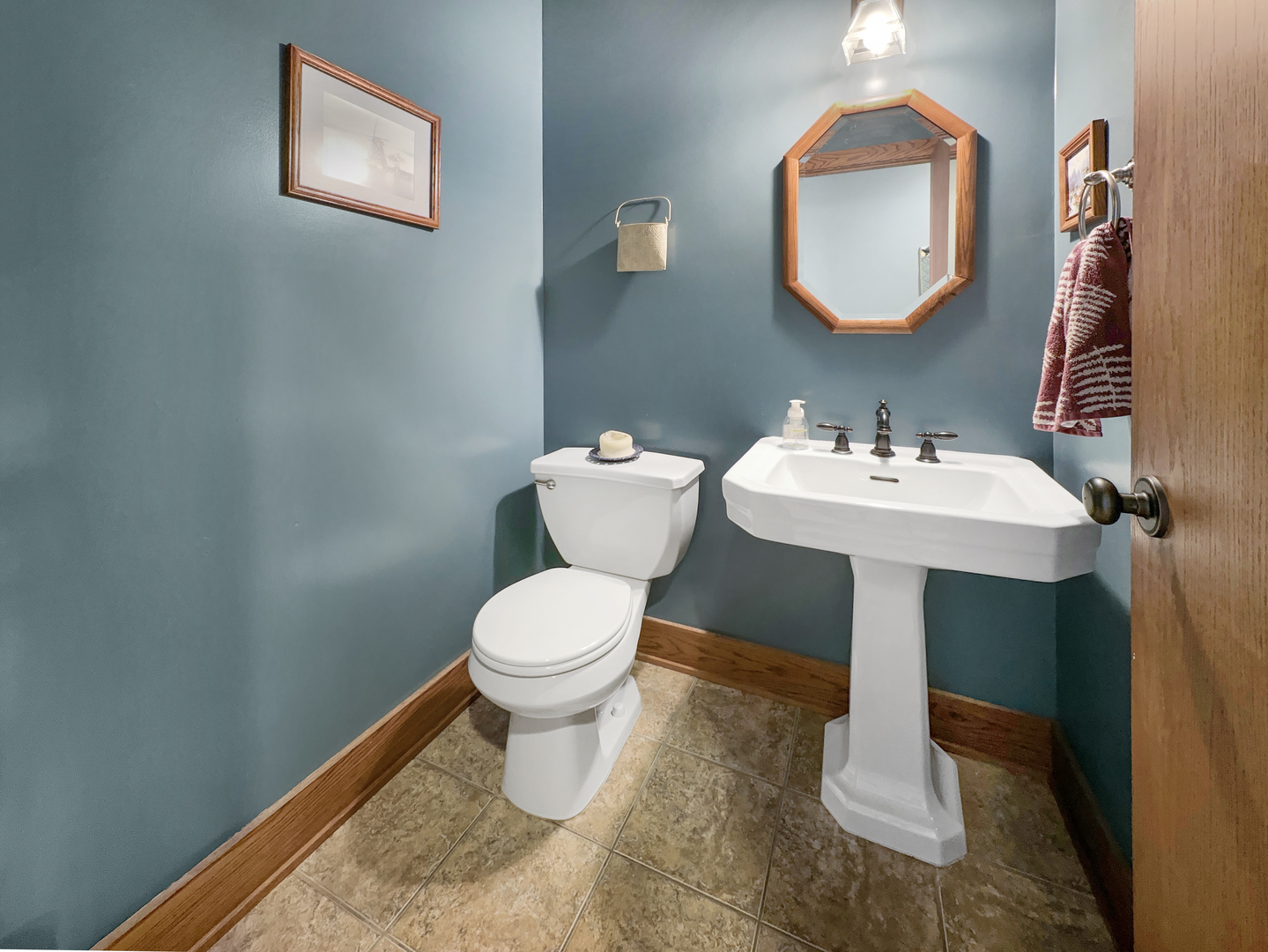 493 Aberdeen Drive Crete, IL 60417 - Photo 24 of 52 a bathroom with a toilet sink and mirror