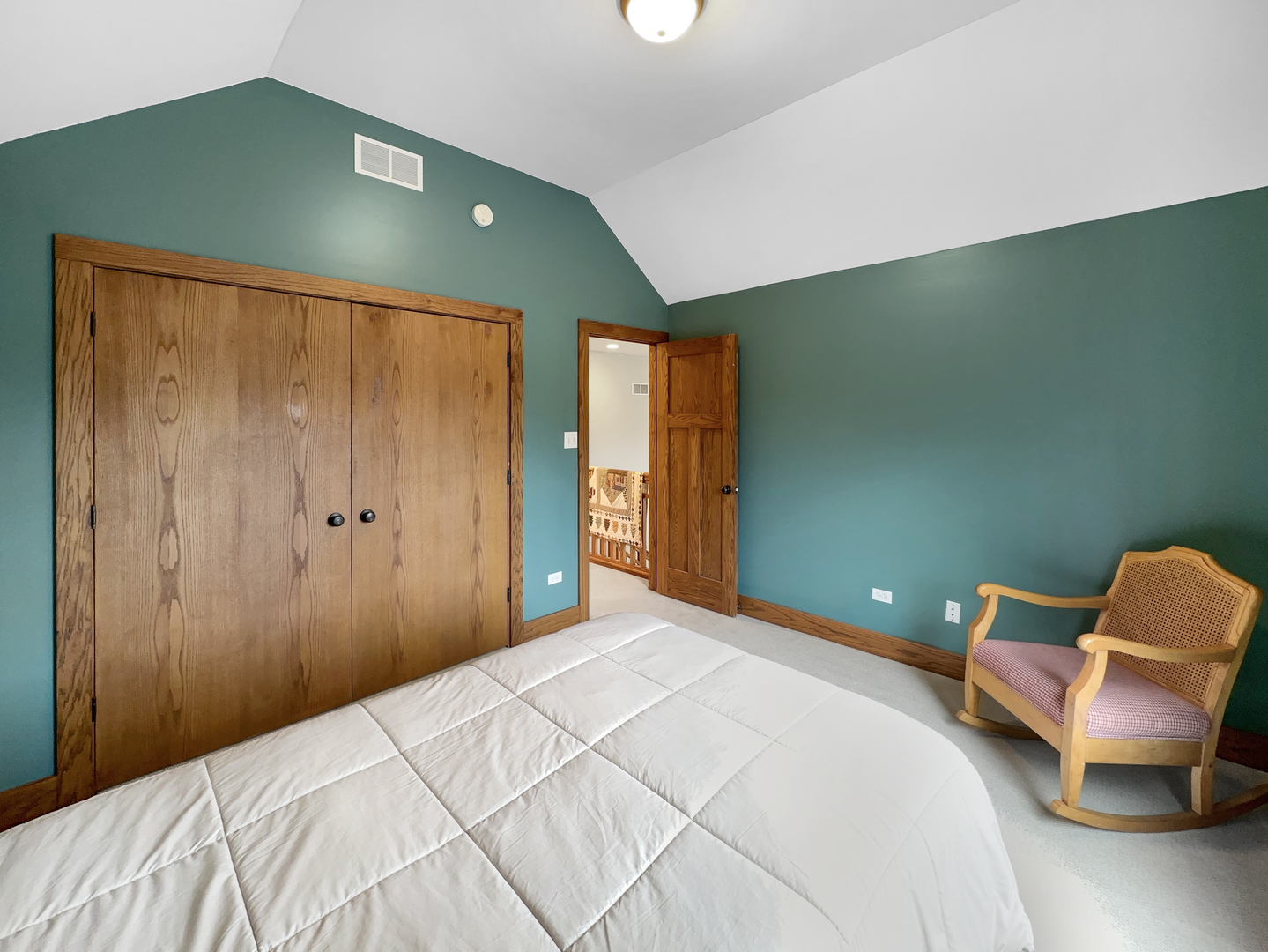 493 Aberdeen Drive Crete, IL 60417 - Photo 39 of 52 a bedroom with a bed and a chair