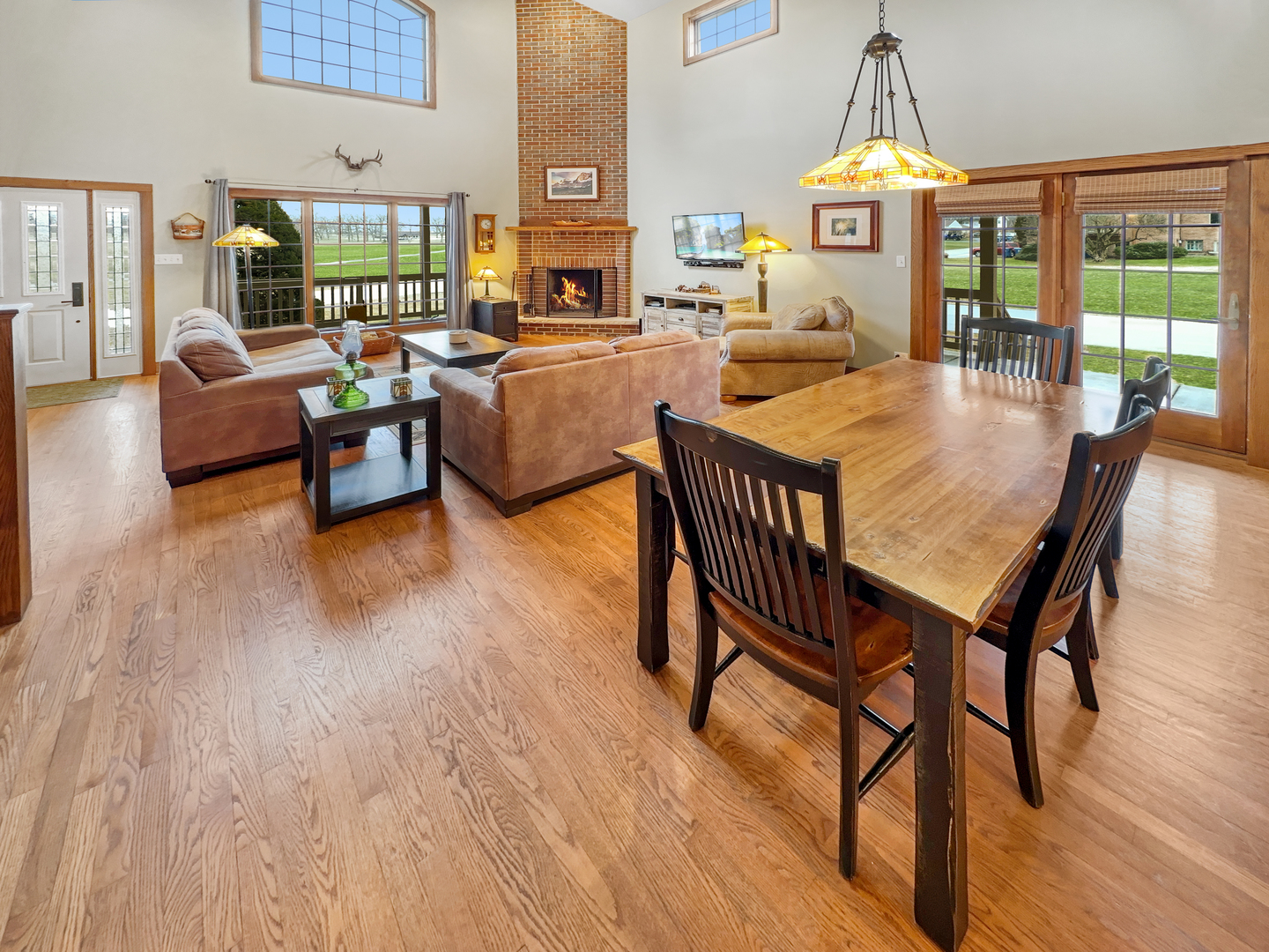 493 Aberdeen Drive Crete, IL 60417 - Photo 9 of 52 a dining room with furniture a chandelier and wooden floor