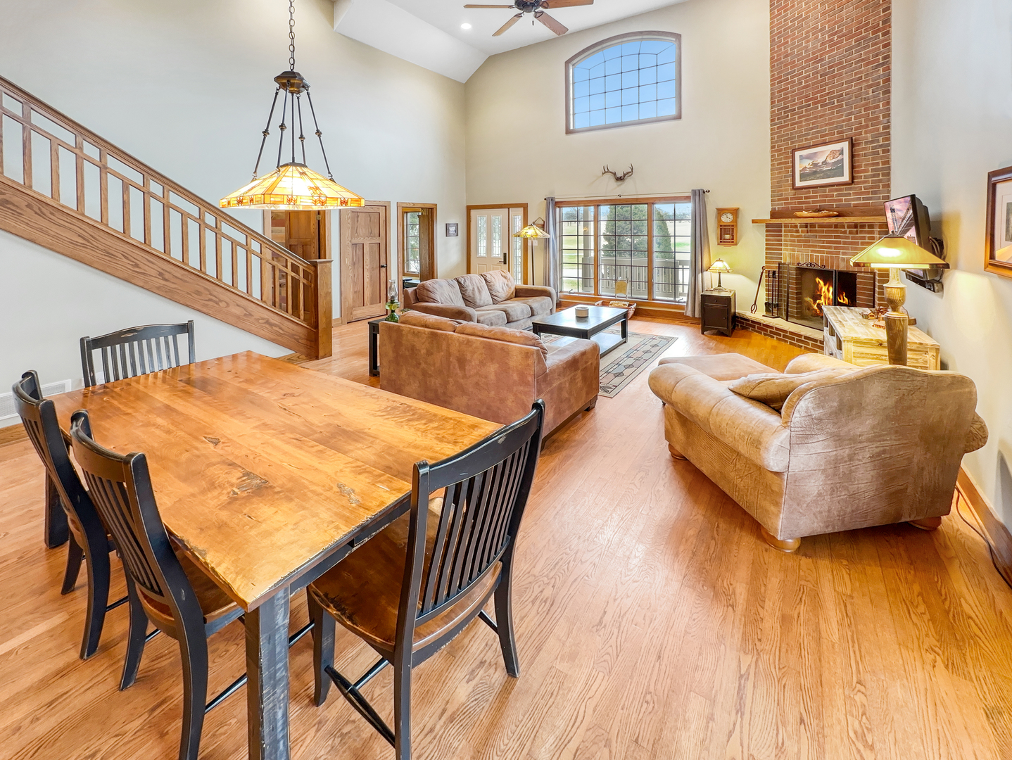 493 Aberdeen Drive Crete, IL 60417 - Photo 10 of 52 a living room with fireplace furniture and a wooden floor