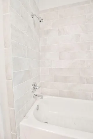a bathroom with a bathtub