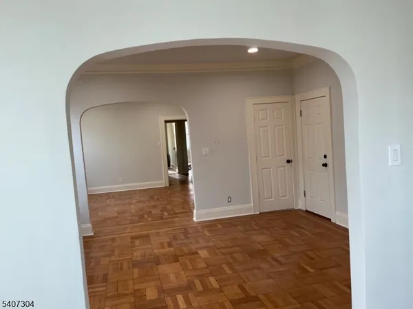 a wall with a painting on the wall