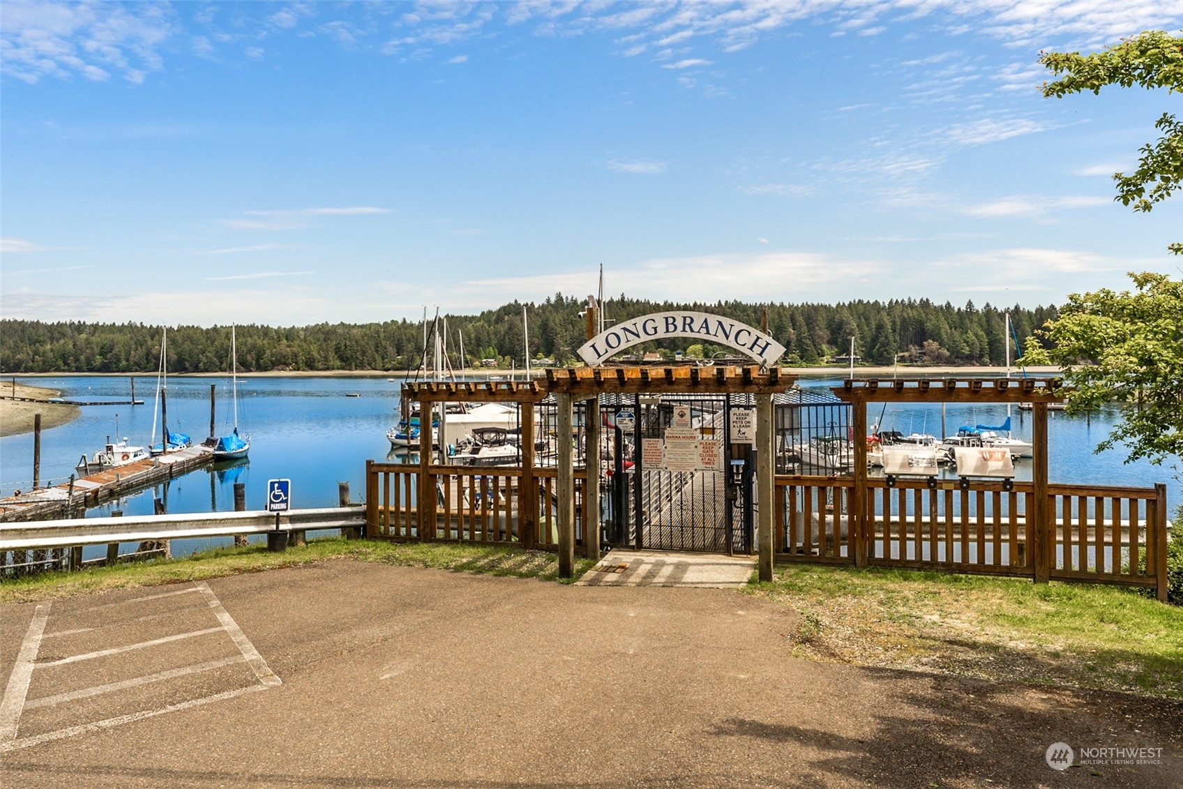 5006 165th Avenue Southwest Longbranch, WA 98351 - Photo 4 of 11 a view of a lake with a city view