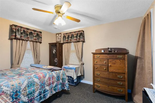 a bedroom with a bed and a closet