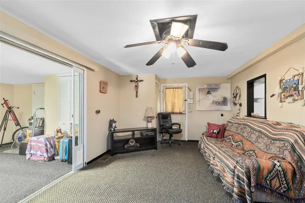 a bedroom with furniture and a large bed