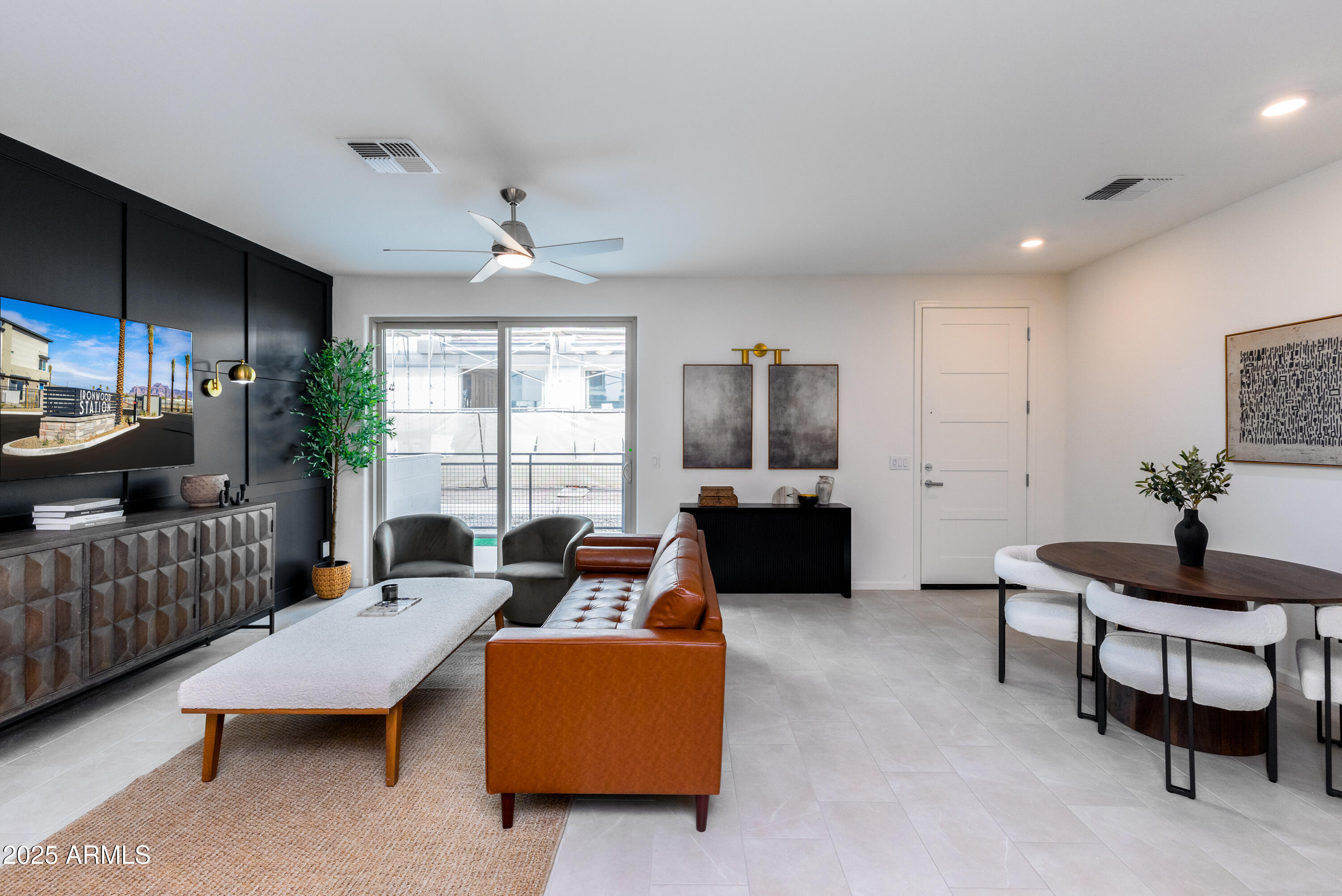 651 North Ironwood Drive, Unit 3 Apache Junction, AZ 85120 - Photo 14 of 48 a living room with furniture and a flat screen tv