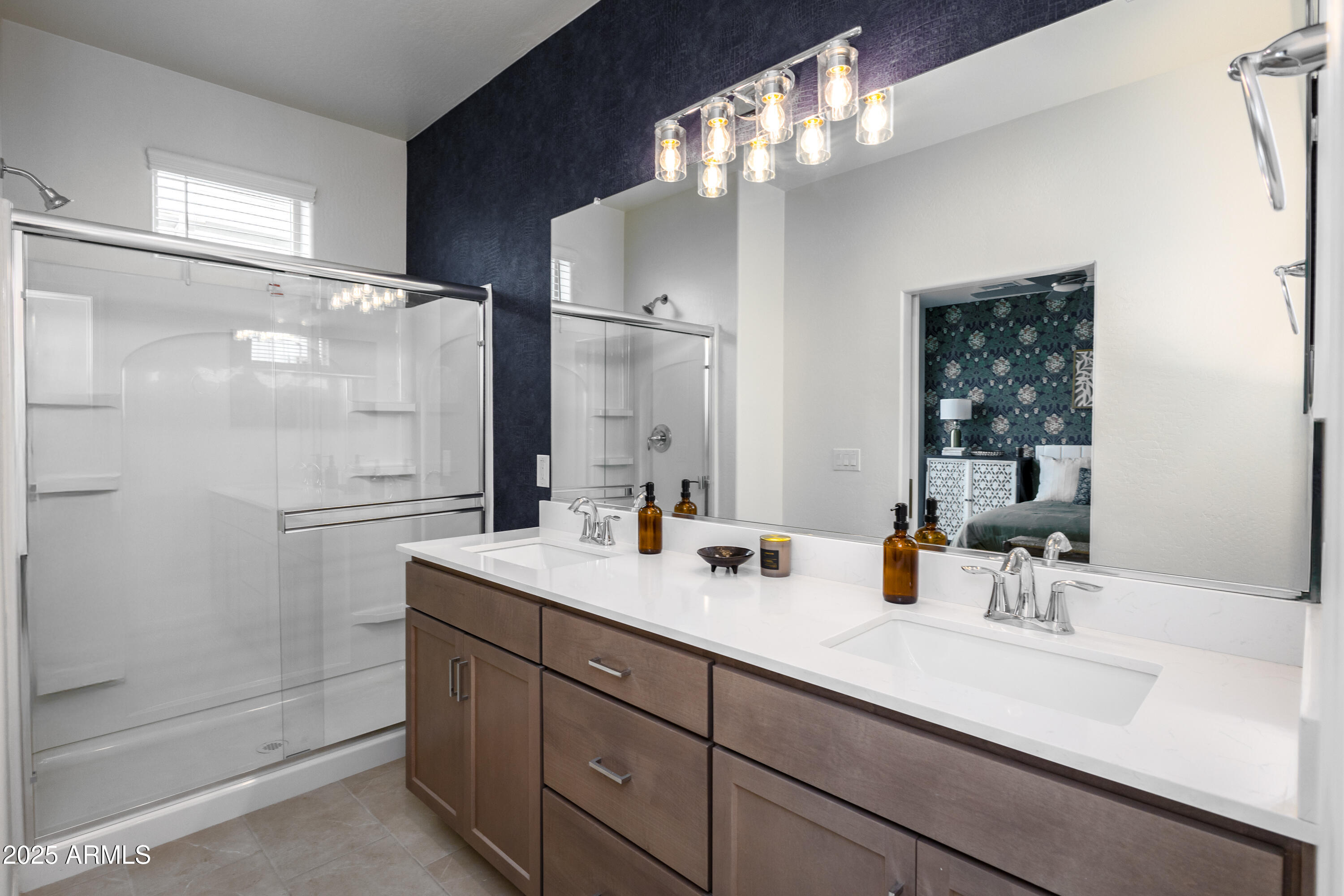 651 North Ironwood Drive, Unit 3 Apache Junction, AZ 85120 - Photo 34 of 48 a bathroom with a double vanity sink mirror and shower