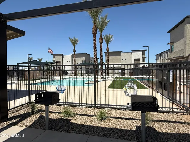 a view of a balcony with two chairs