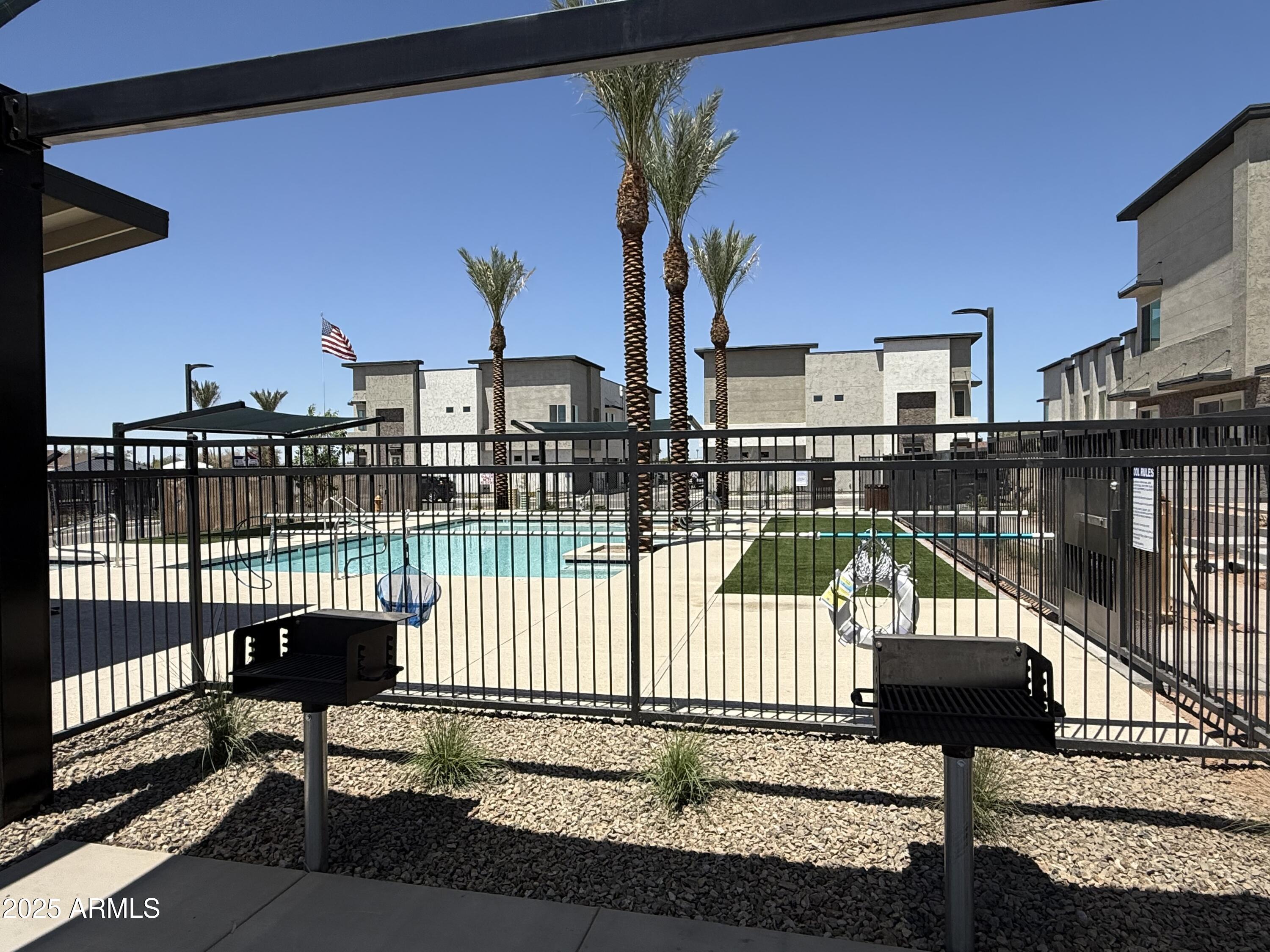 651 North Ironwood Drive, Unit 3 Apache Junction, AZ 85120 - Photo 48 of 48 a view of a balcony with two chairs
