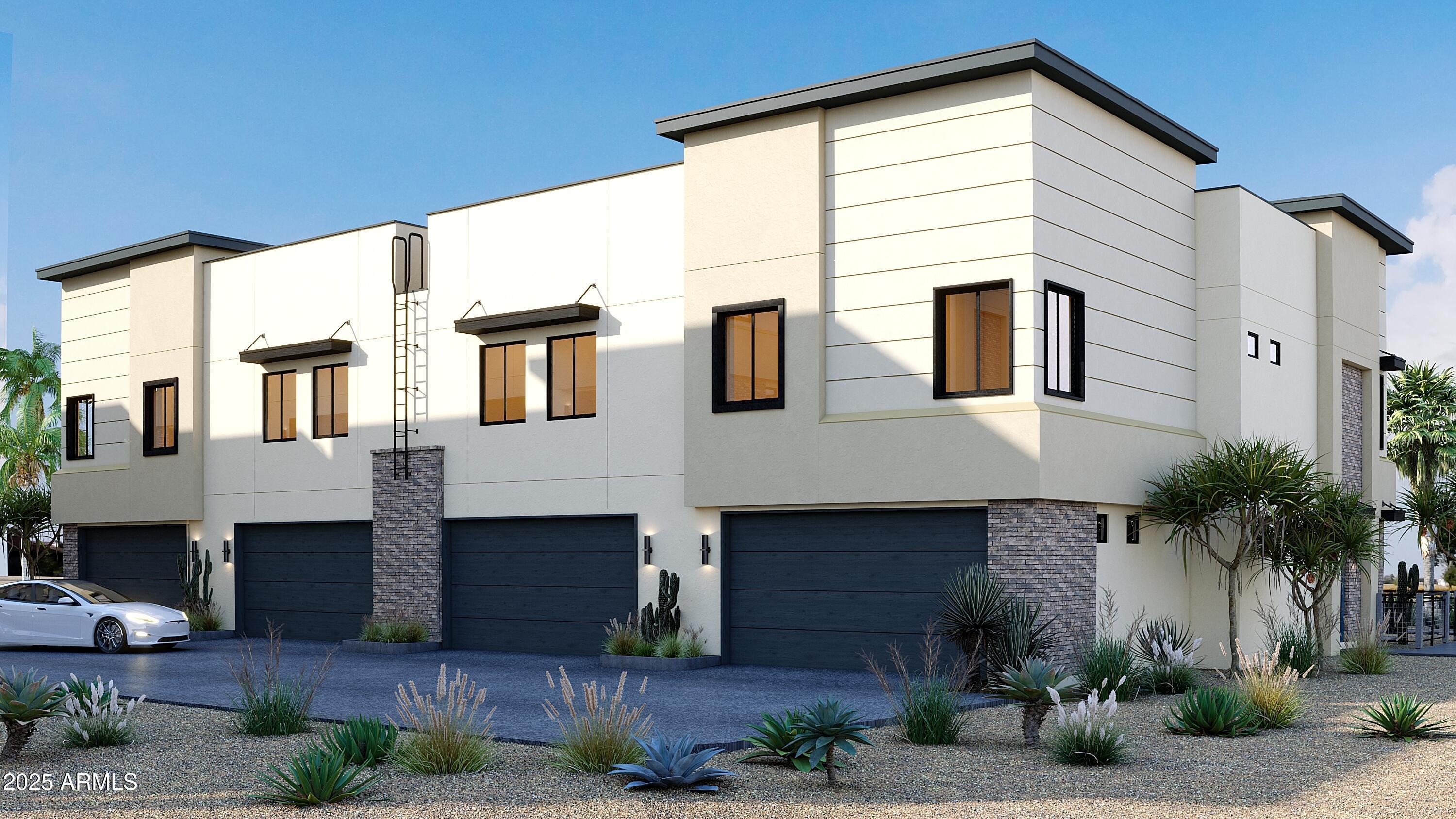651 North Ironwood Drive, Unit 3 Apache Junction, AZ 85120 - Photo 5 of 48 a front view of a house with plants