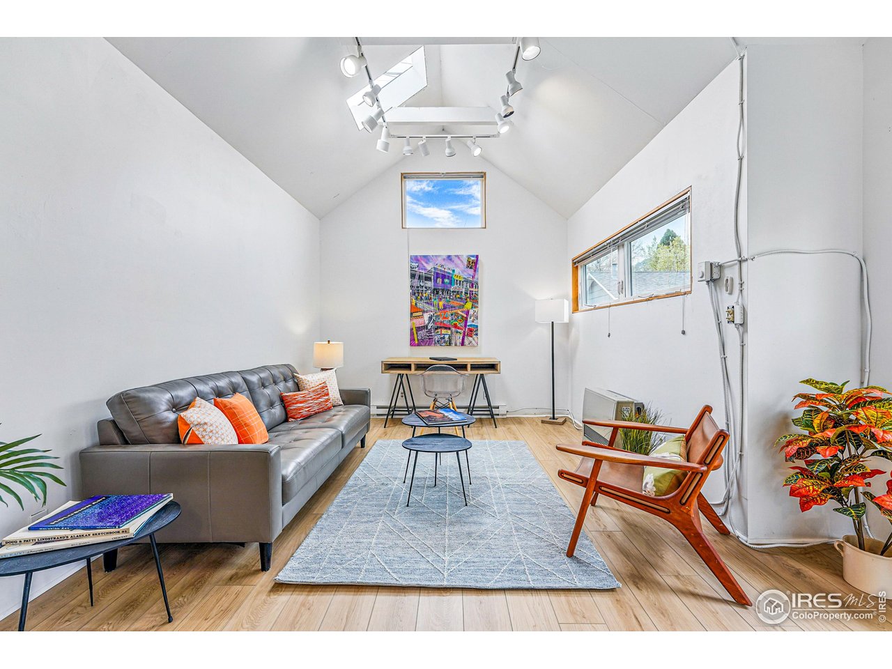 644 Dewey Avenue Boulder, CO 80304 - Photo 6 of 39 a living room with furniture and a couch