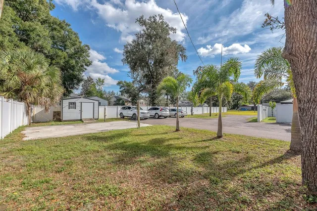 a view of a park with swings and slides