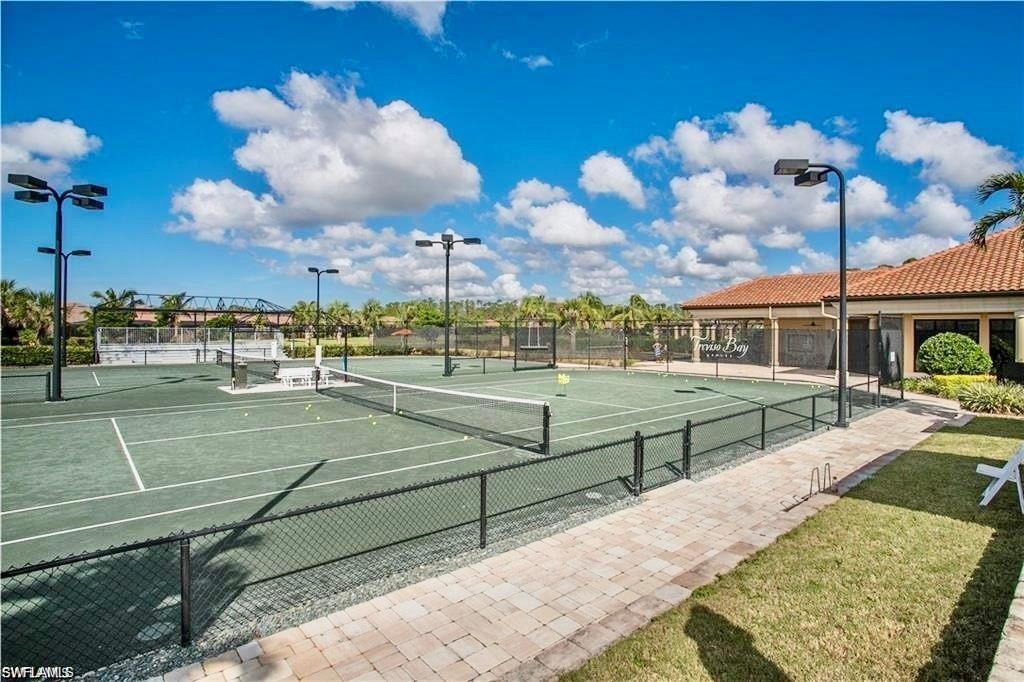9735 Acqua Court, Unit 611 Naples, FL 34113 - Photo 27 of 30 View of tennis court