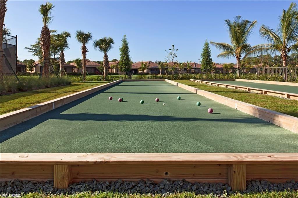 9735 Acqua Court, Unit 611 Naples, FL 34113 - Photo 29 of 30 Surrounding community with a bocce ball area and a residential view