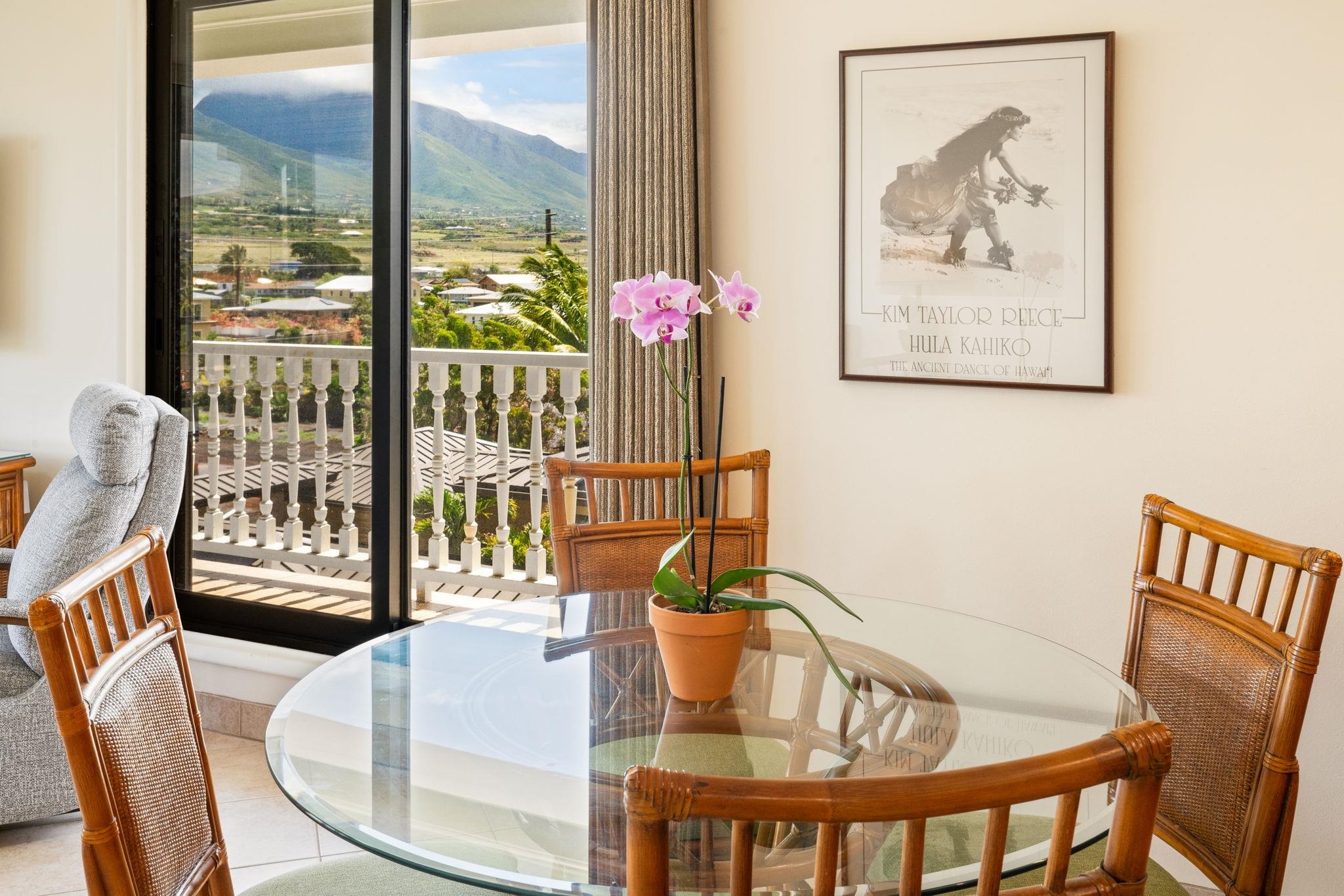 475 Front Street, Unit 402 Lahaina, HI 96761 - Photo 17 of 34 a view of a dining room with furniture window and wooden floor