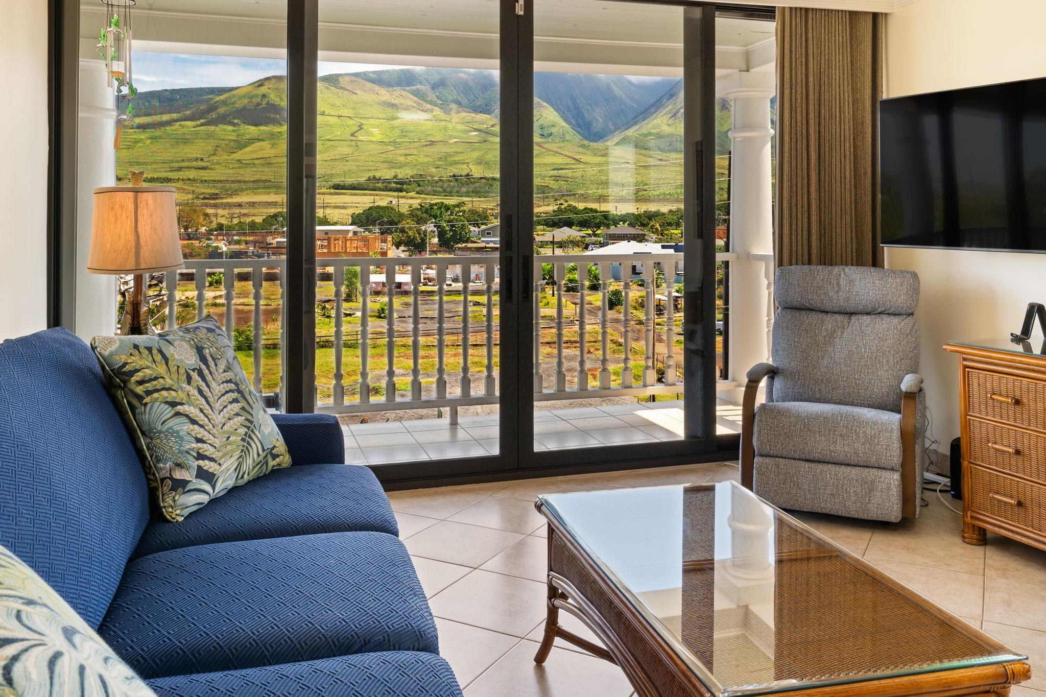 475 Front Street, Unit 402 Lahaina, HI 96761 - Photo 20 of 34 a living room with furniture and a floor to ceiling window