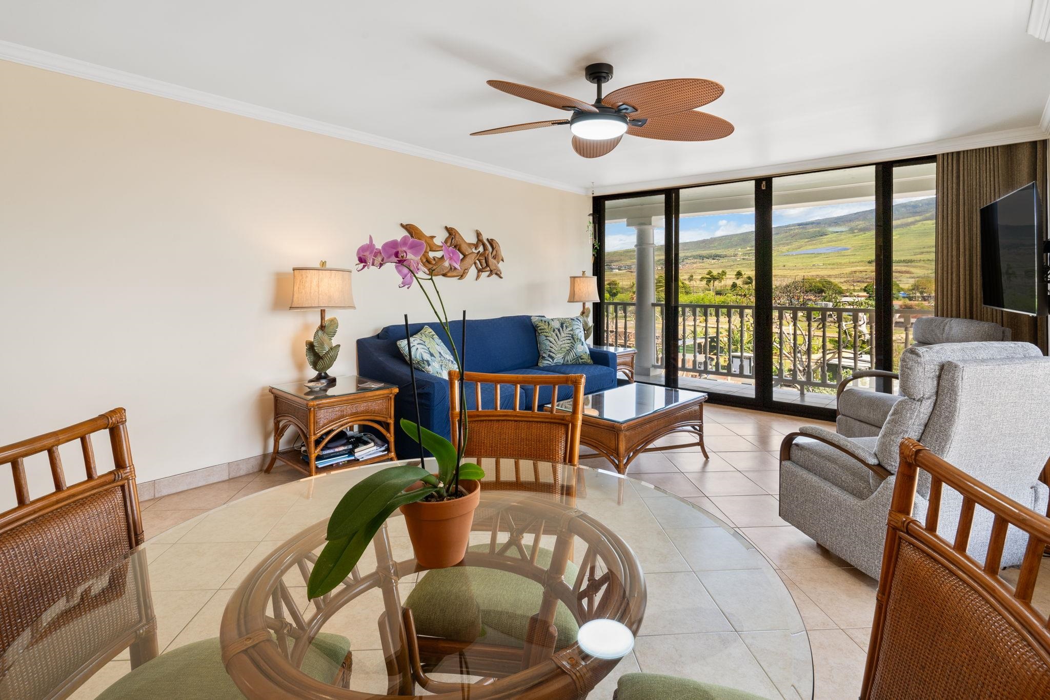 475 Front Street, Unit 402 Lahaina, HI 96761 - Photo 3 of 34 a living room with furniture and a large window